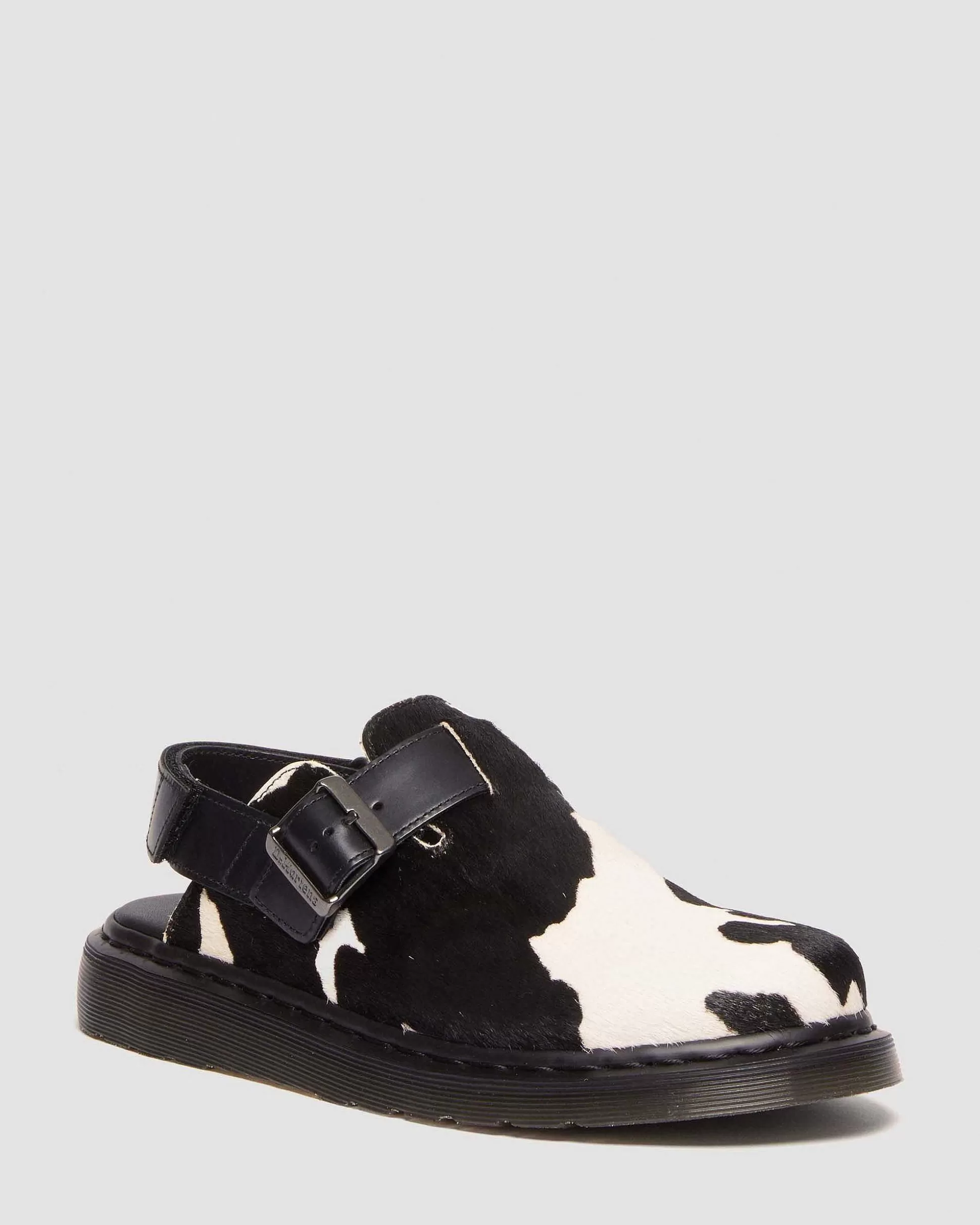 Herren Dr. Martens Schwarze Sandalen>Jorge Ii Hair-On Mules Mit Kuhmuster