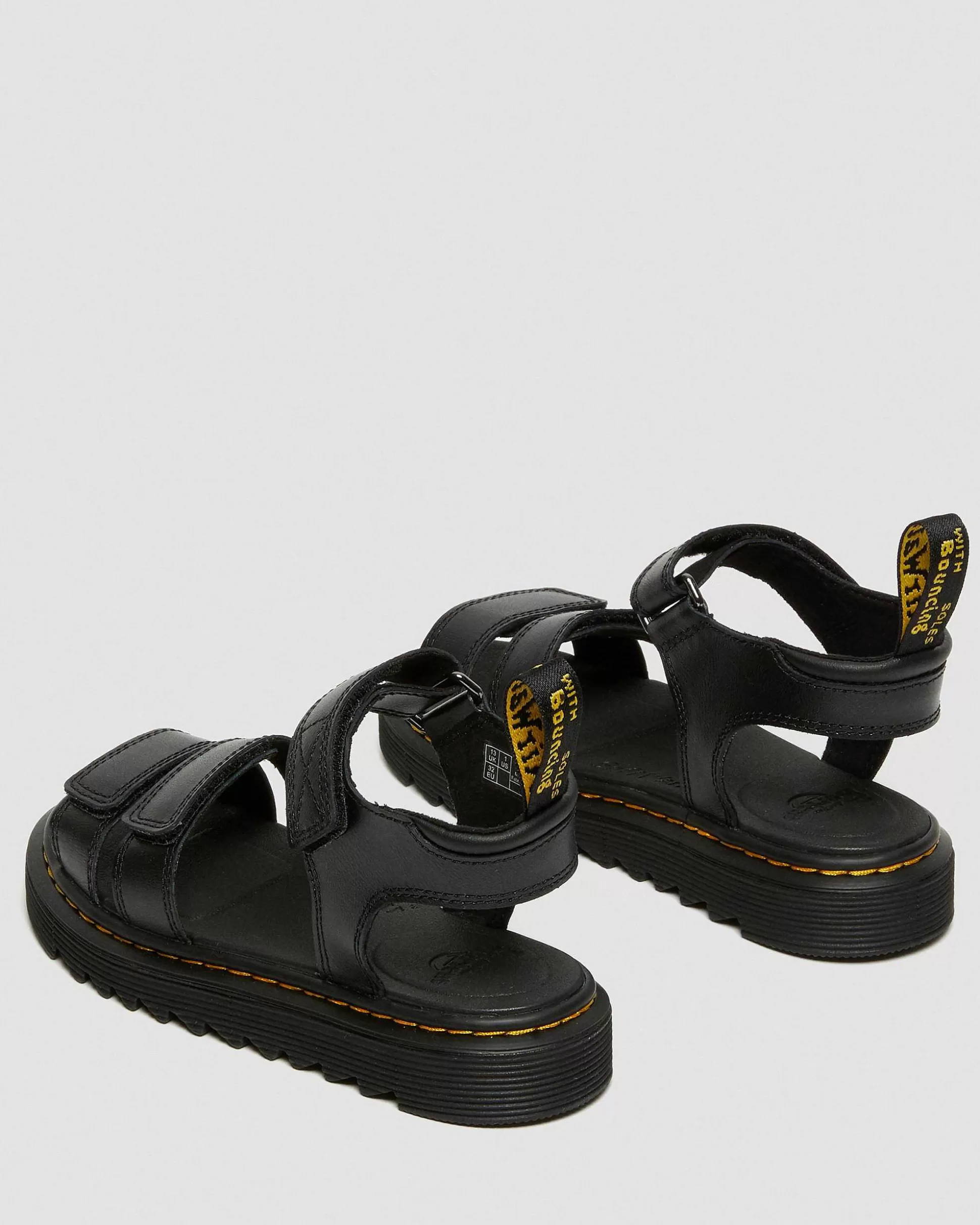 Unisex Dr. Martens Schwarze Sandalen>Junior Klaire Lederband Sandalen